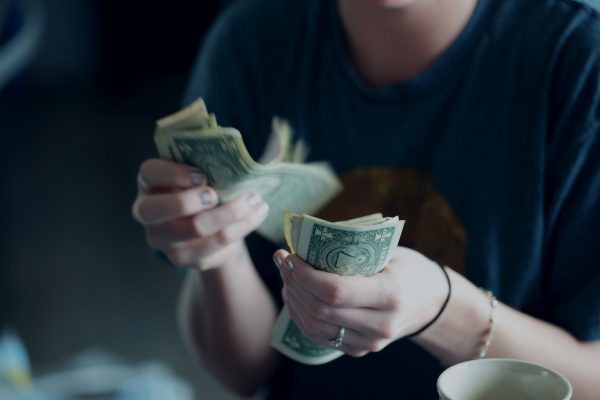 Image of woman in paying cash